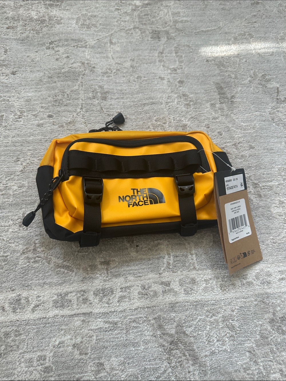 The North Face Men’s Base Camp Lumbar Bag. Summit Gold/Black. NWT’s.
